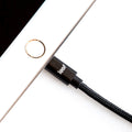 The Leef iPhone cable shown inserted into an iPad's lightning port